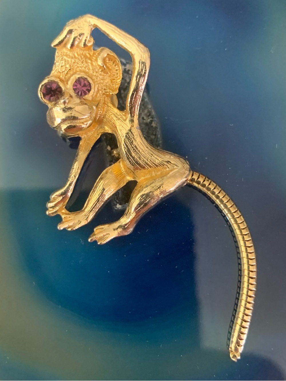 Articulated Monkey Brooch Gold-tone with Red Eyes